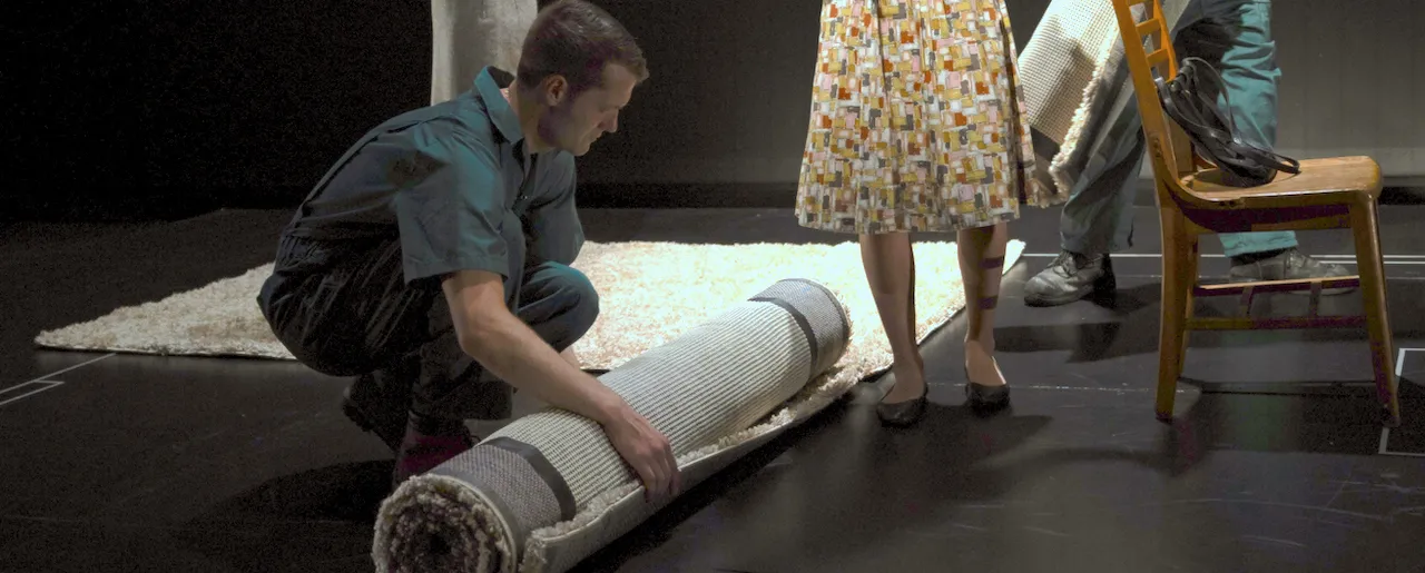 Rolling up a rug