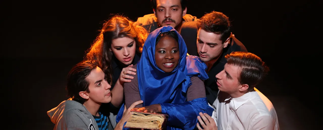 Group of Performers with Book